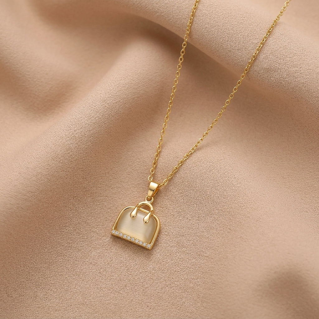 The Lumina Minaudière Pendant Necklace