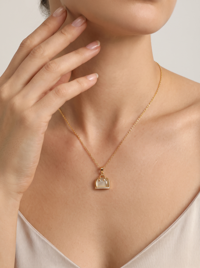The Lumina Minaudière Pendant Necklace